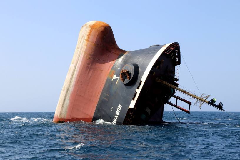 The Rubymar cargo ship partly submerged off the coast of Yemen. The bulk carrier went down off Yemen after a Huthi missile attack. Image: Khaled Ziad via Getty Images